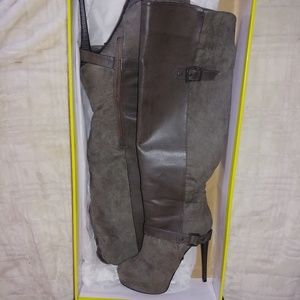 Knee high heeled boots